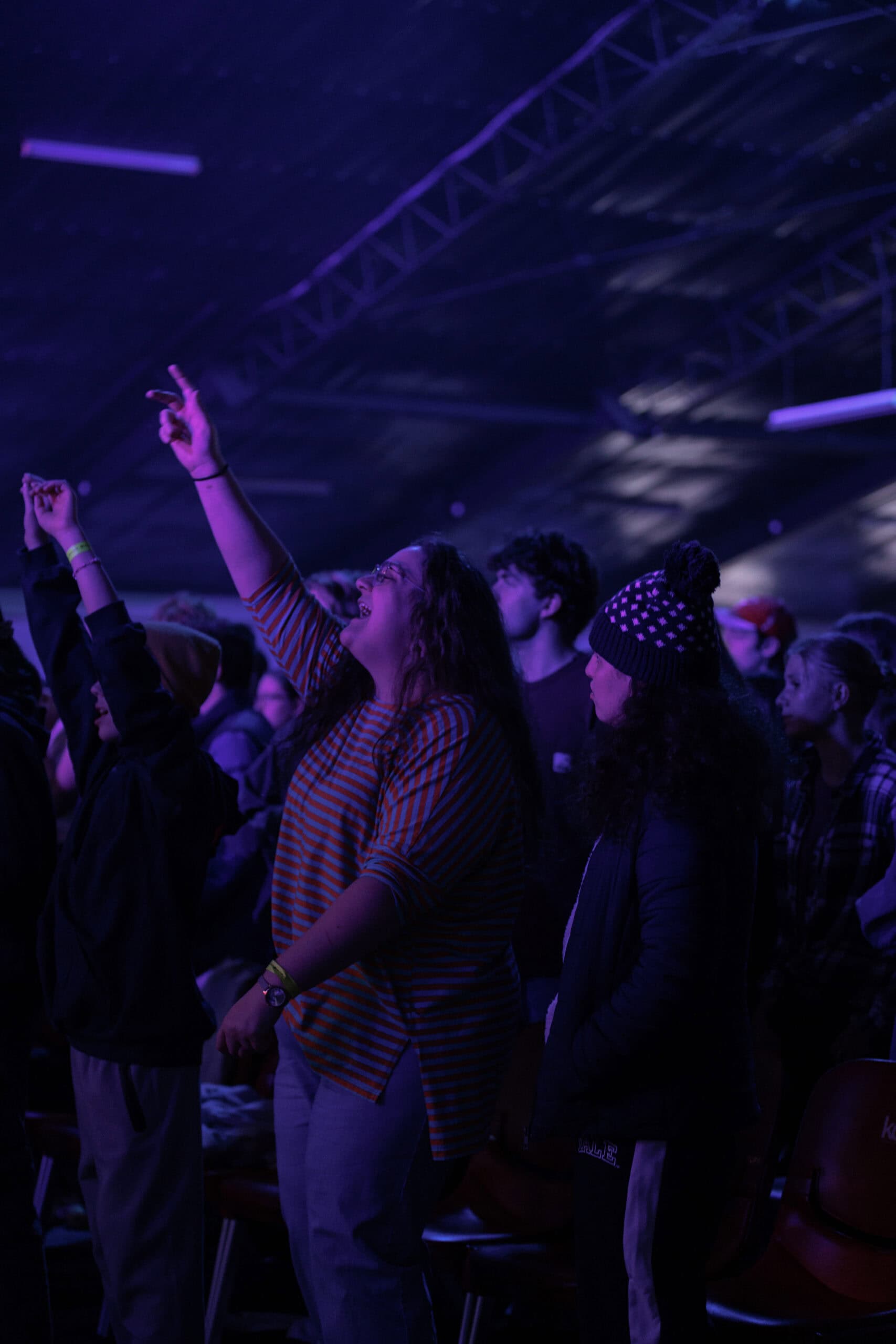 1D6A4316 People enjoying KYCK 2026 music festival at night with vibrant stage lighting and enthusiastic crowd for youth event in Australia.